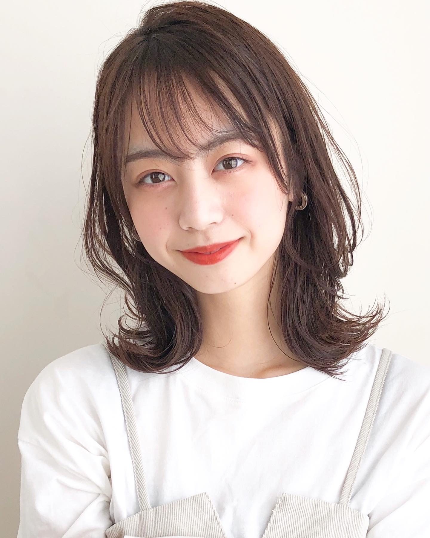 外ハネくびれ毛先パーマ