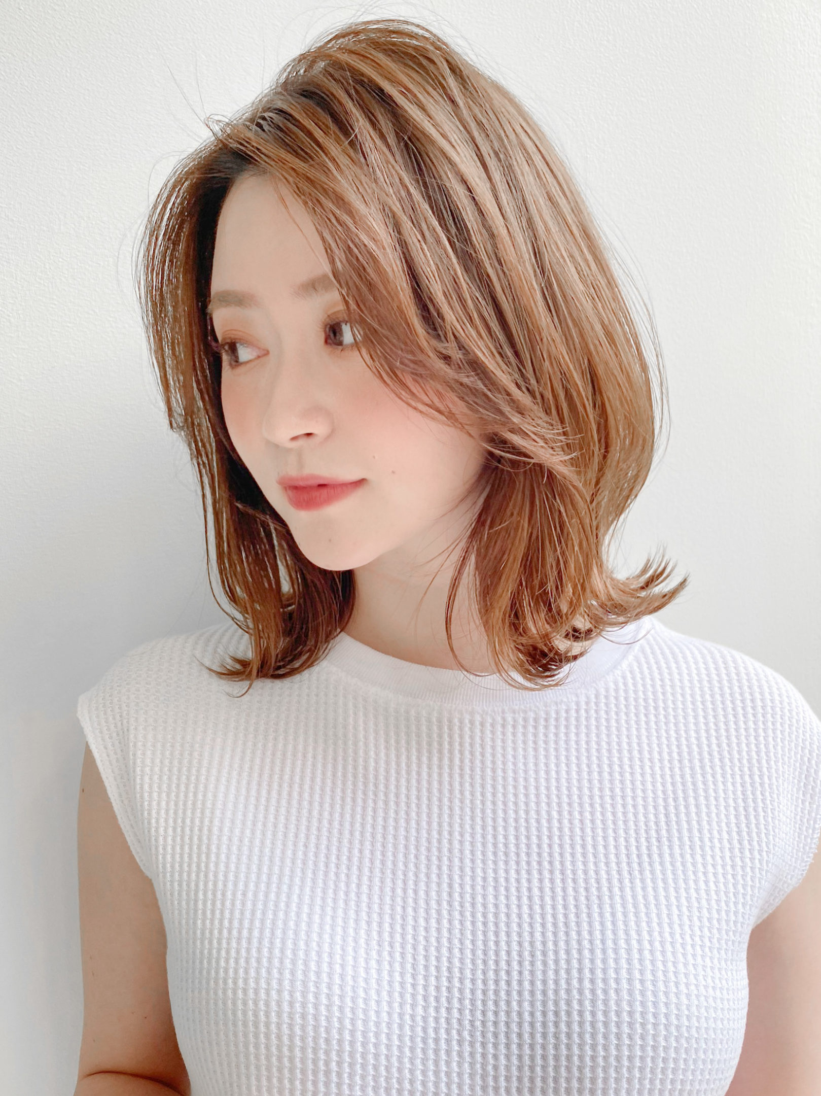 前髪なしで大人かわいい ワンランク上の大人くびれミディ 表参道 青山の美容院 美容室グループ Kanow Group